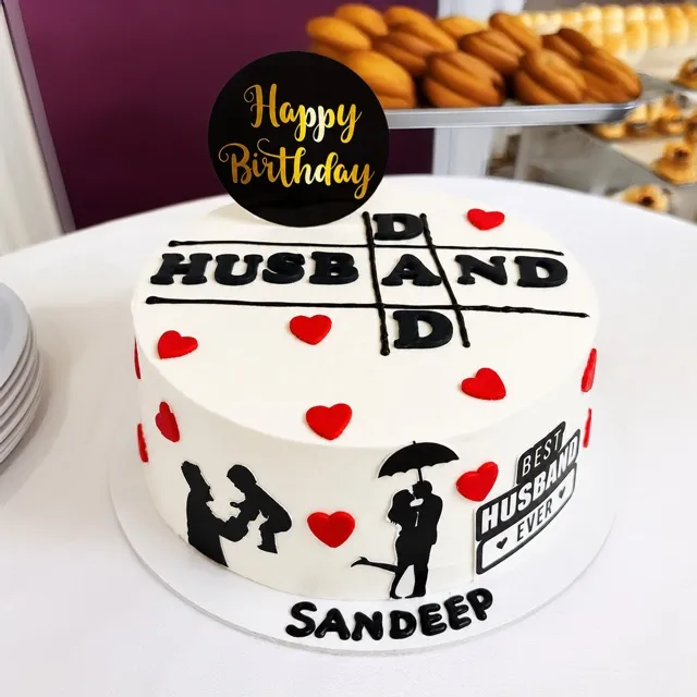 A Tic-Tac-Toe Birthday Cake for Dad — A tongue-in-cheek tic-tac-toe cake for a husband and dad, finished with hand-cut silhouettes and piped hearts.