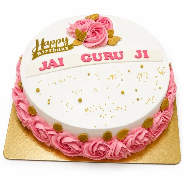 A Piped-Rose Cake for Guru Ji — Delicate piped pink roses and gold leaf detailing, finished with a hand-lettered message band.